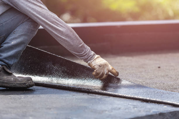 Professional Basement Waterproofing technician working in New Holland, OH